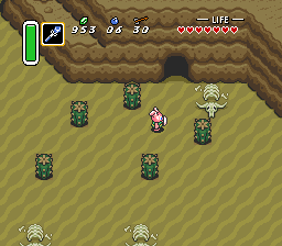 Link in front of cave